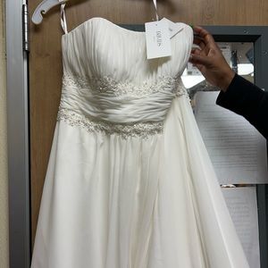 I have a white wedding dress never worn with tags. I also have 5 bridesmaids dre